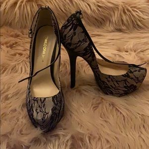 Black and nude lace pumps